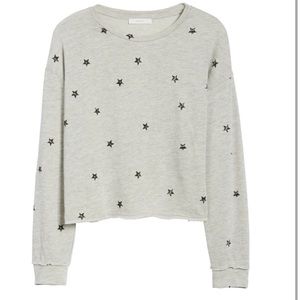 Cropped star print crewneck long sleeve sweater